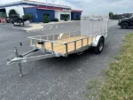 Carry-On 6 x 12 Aluminum Landscape Utility Trailer, buy Carry-On utility trailer online, rear mesh gate trailer, aluminum landscape trailers for sale, 6 x 12 utility trailer specifications, durable utility trailers, landscape equipment transport, trailer payload capacity, construction utility trailers, easy to tow trailers, utility trailer features and benefits, landscaping tools transport, personal use utility trailers, customization options for trailers, cost-effective utility transport, trailer maintenance tips, safety guidelines for towing, outdoor equipment hauling, customer reviews for Carry-On trailers, supplier of aluminum utility trailers, versatile trailer designs, affordable utility trailers, towing vehicle compatibility, trailer buying guide, durable finish options, common uses for utility trailers, impact of weight on towing, seasonal hauling solutions